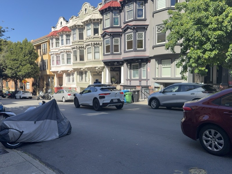A Waymo parked on a residential street in San Francisco